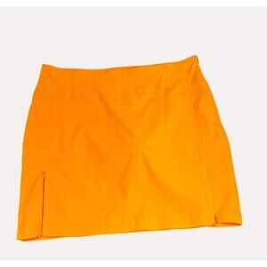 Antigua Womens size 12 desert dry Golf Skort Orange